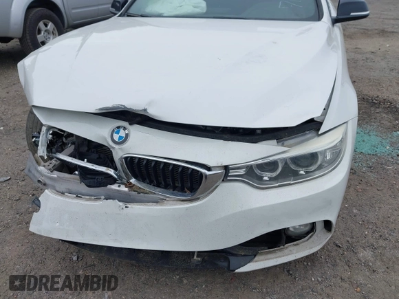2014 BMW 4 Series 428i z VIN WBA3N3C5XEF711746, wystawiony jako IAAI lot #42215565 z przebiegiem 113 941 mil mil oraz . Historia ofert i sprzedaży dostępna na DreamBid. Obrazek 6.