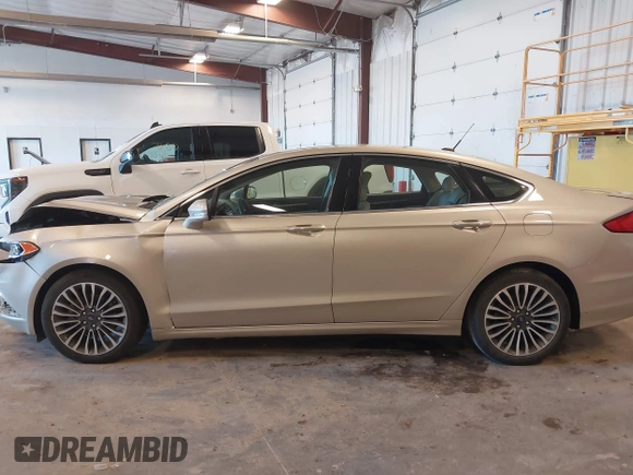 2018 Ford Fusion Titanium с VIN 3FA6P0D9XJR246737, выставлен на аукционе IAAI как лот 42274631 с пробегом 88 247 миль миль и . История ставок и продаж доступна на DreamBid. Изображение 14.