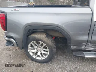 2021 GMC Sierra 1500 SLT z VIN 3GTU9DET8MG413416, wystawiony jako IAAI lot #41935465 z przebiegiem 70 547 mil mil oraz . Historia ofert i sprzedaży dostępna na DreamBid. Obrazek 17.