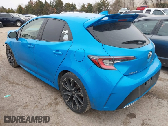 2019 Toyota Corolla Hatchback SE with VIN JTNK4RBEXK3033062, listed as a IAAI auction lot 41471618 with 195,001 mi miles. Bid and sale history available at carsss.com. Image 3.