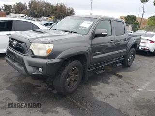 2014 Toyota Tacoma PreRunner with VIN 3TMJU4GN5EM167783, listed as a IAAI auction lot 42031603 with 179,574 mi miles and . Bid and sale history available at DreamBid. Image 18.