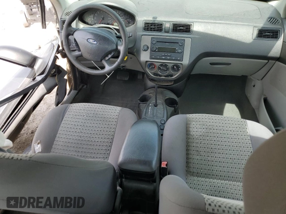 2007 Ford Focus S z VIN 1FAHP34N17W103625, wystawiony jako Copart lot #55300395 z przebiegiem 82 041 mil mil oraz Szkoda całkowita • Salvage title. Historia ofert i sprzedaży dostępna na DreamBid. Obrazek 8.