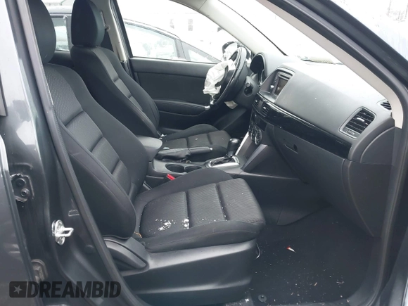 2014 Mazda CX-5 Touring with VIN JM3KE2CY2E0407453, listed as a IAAI auction lot 41564916 with 104,852 mi miles. Bid and sale history available at carsss.com. Image 5.