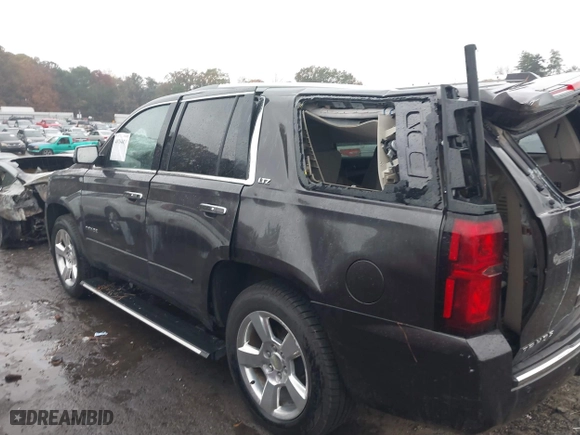 2015 Chevrolet Tahoe LTZ with VIN 1GNSCCKC7FR576236, listed as a IAAI auction lot 40794643 with 170,040 mi miles. Bid and sale history available at carsss.com. Image 14.