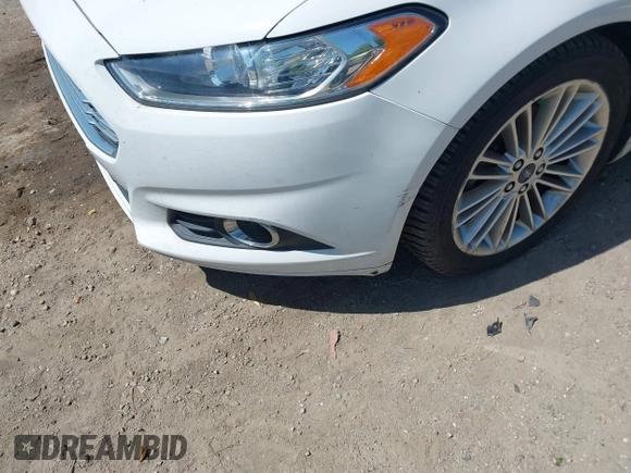 2013 Ford Fusion SE Hybrid with VIN 3FA6P0LU4DR337674, listed as a IAAI auction lot 42164262 with 150,902 mi miles and . Bid and sale history available at carsss.com. Image 14.
