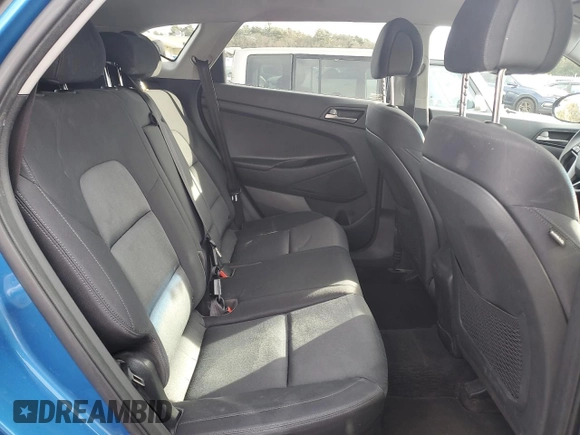 2018 Hyundai Tucson SE z VIN KM8J2CA45JU806388, wystawiony jako Copart lot #41535045 z przebiegiem 215 813 mil mil oraz Szkody całkowita. Historia ofert i sprzedaży dostępna na DreamBid. Obrazek 11.