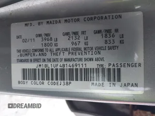 2011 Mazda 3 i Sport with VIN JM1BL1UF4B1469111, listed as a IAAI auction lot 41487054 with 183,965 mi miles and . Bid and sale history available at DreamBid. Image 9.