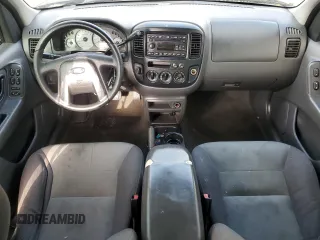 2004 Ford Escape XLS with VIN 1FMYU92104KA21454, listed as a Copart auction lot 74139564 with 217,731 mi miles and Salvage Title. Bid and sale history available at carsss.com. Image 8.