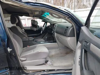 2004 Toyota 4Runner SR5 with VIN JTEBU14R348024422, listed as a IAAI auction lot 42007051 with 156,289 mi miles and . Bid and sale history available at DreamBid. Image 5.