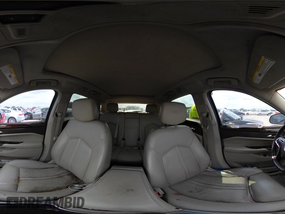 2015 Cadillac SRX Luxury Collection with VIN 3GYFNBE36FS560305, listed as a IAAI auction lot 42142934 with 160,543 mi miles and . Bid and sale history available at carsss.com. Image 18.