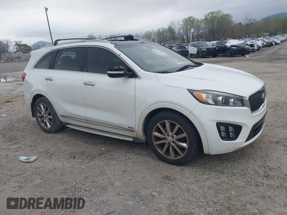 2016 Kia Sorento SX z VIN 5XYPKDA59GG113511, wystawiony jako IAAI lot #41997346 z przebiegiem 140 017 mil mil oraz . Historia ofert i sprzedaży dostępna na DreamBid. Obrazek 1.