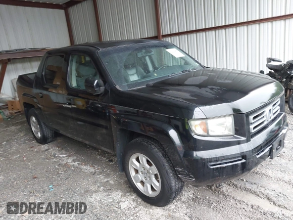 2007 Honda Ridgeline RTL with VIN 2HJYK16547H549241, listed as a IAAI auction lot 42282477 with 214,685 mi miles and . Bid and sale history available at DreamBid. Image 1.
