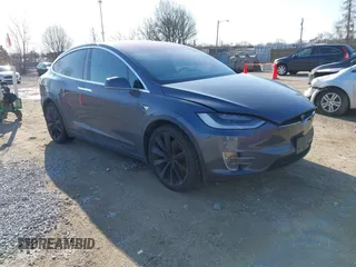 2020 Tesla Model X Long Range with VIN 5YJXCBE2XLF230629, listed as a IAAI auction lot 41925961 with 35,979 mi miles. Bid and sale history available at carsss.com. Image 1.