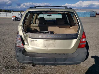 2003 Subaru Forester X with VIN JF1SG63643H749063, listed as a Copart auction lot 77862214 with 155,077 mi miles and Salvage Title. Bid and sale history available at carsss.com. Image 6.