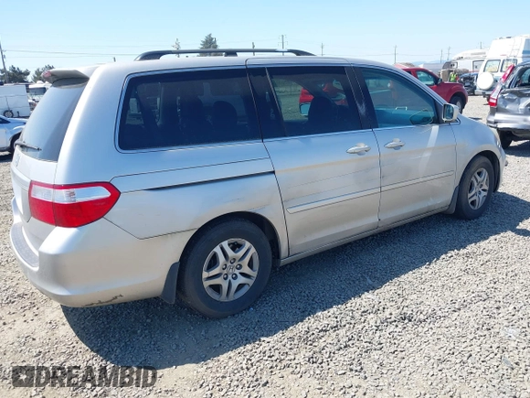 2006 Honda Odyssey EX-L with VIN 5FNRL38726B424923, listed as a IAAI auction lot 42099212 with 171,749 mi miles. Bid and sale history available at carsss.com. Image 4.