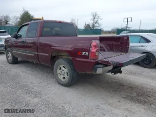 2003 Chevrolet Silverado 1500 LS with VIN 2GCEK19TX31219785, listed as a IAAI auction lot 41716084 with 297,991 mi miles. Bid and sale history available at carsss.com. Image 3.