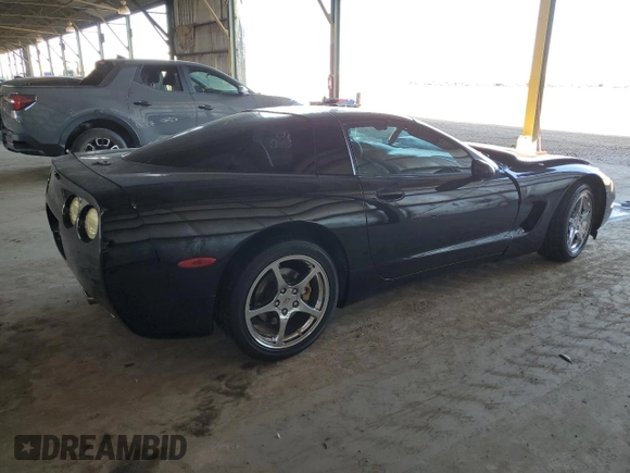 2002 Chevrolet Corvette with VIN 1G1YY22G725125125, listed as a Copart auction lot 73348114 with 94,048 mi miles and Salvage Title. Bid and sale history available at carsss.com. Image 3.