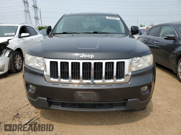 2011 Jeep Grand Cherokee Laredo with VIN 1J4RR4GGXBC567450, listed as a Copart auction lot 60056085 with 165,077 mi miles and Salvage title. Bid and sale history available at DreamBid. Image 5.