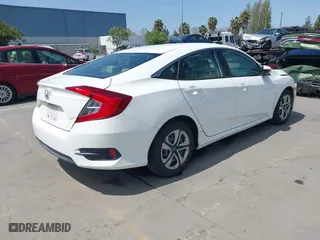2016 Honda Civic Sedan LX with VIN 19XFC2F54GE215012, listed as a IAAI auction lot 42046334 with 146,348 mi miles. Bid and sale history available at carsss.com. Image 4.