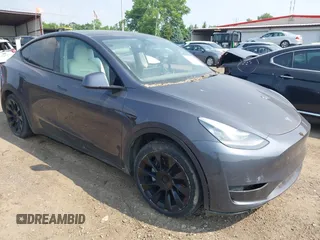 2021 Tesla Model Y Long Range z VIN 5YJYGDEE7MF140144, wystawiony jako IAAI lot #42350137 z przebiegiem Nie podano mil oraz . Historia ofert i sprzedaży dostępna na DreamBid. Obrazek 1.
