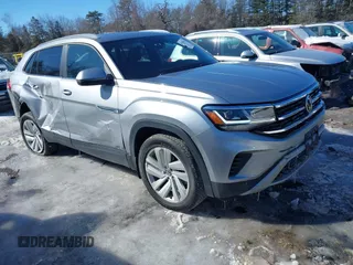 2021 Volkswagen Atlas SE z VIN 1V2KE2CA4MC228516, wystawiony jako IAAI lot #41630396 z przebiegiem 53 946 mil mil oraz . Historia ofert i sprzedaży dostępna na DreamBid. Obrazek 1.