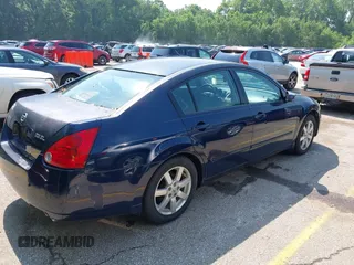 2004 Nissan Maxima SE with VIN 1N4BA41E04C903587, listed as a IAAI auction lot 42433154 with 213,535 mi miles and . Bid and sale history available at DreamBid. Image 4.
