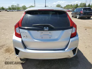 2015 Honda Fit LX с VIN 3HGGK5H5XFM723903, выставлен на аукционе Copart как лот 57249685 с пробегом 90 949 миль миль и Списание • Salvage title. История ставок и продаж доступна на DreamBid. Изображение 6.