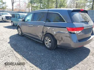 2016 Honda Odyssey SE with VIN 5FNRL5H39GB048487, listed as a IAAI auction lot 42059132 with 140,411 mi miles and . Bid and sale history available at DreamBid. Image 3.