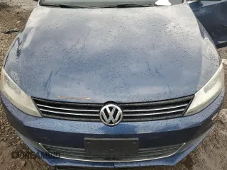 2013 Volkswagen Jetta SE z VIN 3VWDX7AJ3DM443241, wystawiony jako Copart lot #62910875 z przebiegiem 171 337 mil mil oraz Czysty tytuł • Clean title. Historia ofert i sprzedaży dostępna na DreamBid. Obrazek 11.