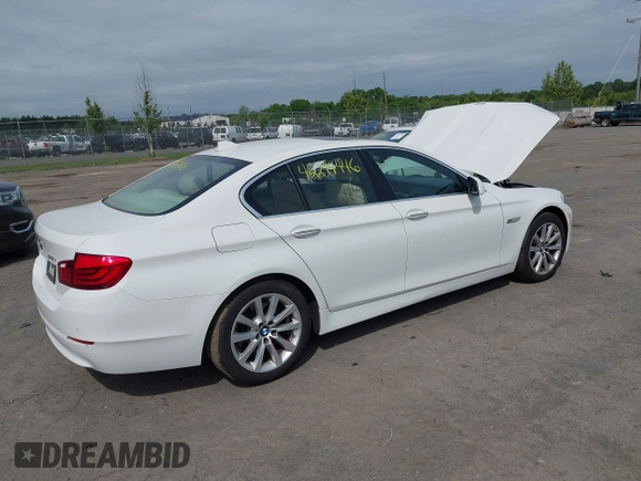 2013 BMW 5 Series 528i xDrive with VIN WBAXH5C54DD107317, listed as a IAAI auction lot 42244446 with 47,858 mi miles and . Bid and sale history available at DreamBid. Image 4.