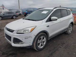 2015 Ford Escape SE with VIN 1FMCU9GX8FUC80918, listed as a IAAI auction lot 41694880 with 182,929 mi miles. Bid and sale history available at carsss.com. Image 2.