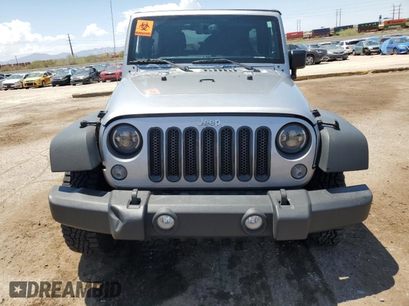 2014 Jeep Wrangler Unlimited Rubicon with VIN 1C4HJWFG1EL241014, listed as a Copart auction lot 63948655 with 165,650 mi miles and Salvage title. Bid and sale history available at DreamBid. Image 5.