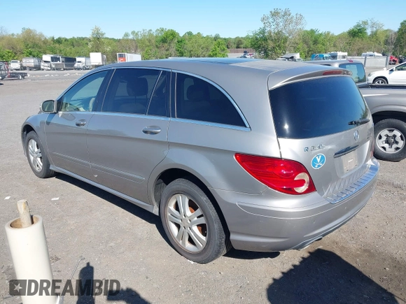 2008 Mercedes-Benz R 3.5L with VIN 4JGCB65E58A082677, listed as a IAAI auction lot 42079869 with 168,754 mi miles. Bid and sale history available at carsss.com. Image 3.
