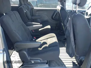 2016 Dodge Grand Caravan SE with VIN 2C4RDGBG8GR335456, listed as a IAAI auction lot 41537809 with 125,081 mi miles and . Bid and sale history available at DreamBid. Image 8.