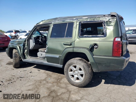 2007 Jeep Commander Sport with VIN 1J8HG48K27C663745, listed as a Copart auction lot 75741314 with 194,534 mi miles and Salvage Title. Bid and sale history available at carsss.com. Image 2.