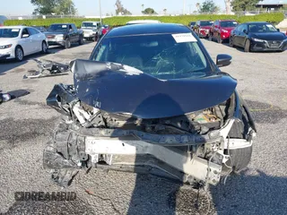 2015 Nissan Altima 2.5 S with VIN 1N4AL3APXFC437185, listed as a IAAI auction lot 41970221 with 134,141 mi miles and . Bid and sale history available at carsss.com. Image 13.