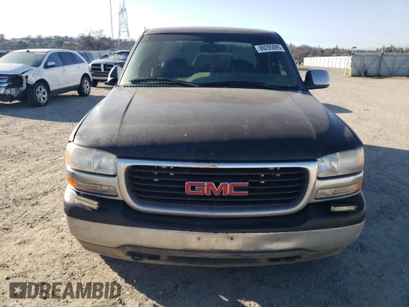 2001 GMC Sierra 1500 SLE z VIN 2GTEC19T811149861, wystawiony jako Copart lot #89205095 z przebiegiem 289 190 mil mil oraz Czysty tytuł • Clean title. Historia ofert i sprzedaży dostępna na DreamBid. Obrazek 5.