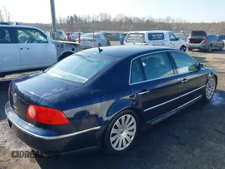 2004 Volkswagen Phaeton V8 z VIN WVWAF63D048009440, wystawiony jako IAAI lot #41495309 z przebiegiem 108 685 mil mil oraz . Historia ofert i sprzedaży dostępna na DreamBid. Obrazek 4.