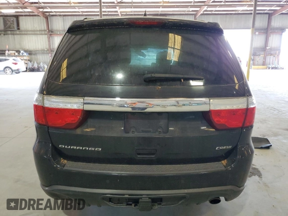 2013 Dodge Durango Crew with VIN 1C4RDHDG5DC617402, listed as a Copart auction lot 58056795 with 180,990 mi miles and Salvage title. Bid and sale history available at DreamBid. Image 6.