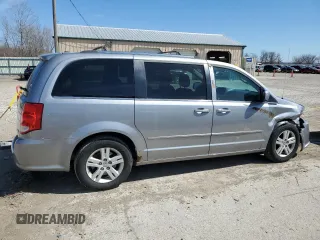 2013 Dodge Grand Caravan Crew with VIN 2C4RDGDG7DR795748, listed as a Copart auction lot 50329195 with 223,956 mi miles and Salvage Title. Bid and sale history available at DreamBid. Image 3.