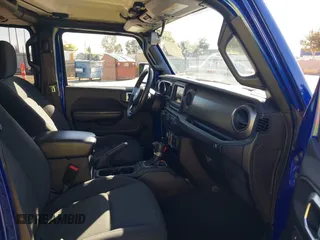 2018 Jeep Wrangler Unlimited Sport z VIN 1C4HJXDGXJW189321, wystawiony jako IAAI lot #42532856 z przebiegiem 46 559 mil mil oraz . Historia ofert i sprzedaży dostępna na DreamBid. Obrazek 5.