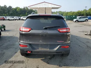 2015 Jeep Cherokee Trailhawk z VIN 1C4PJMBS2FW705132, wystawiony jako Copart lot #59884325 z przebiegiem 100 438 mil mil oraz Szkoda całkowita • Salvage title. Historia ofert i sprzedaży dostępna na DreamBid. Obrazek 6.
