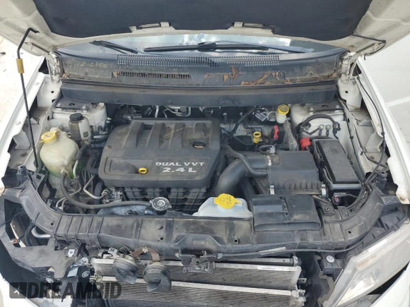 2014 Dodge Journey American Value with VIN 3C4PDCAB3ET216889, listed as a Copart auction lot 60874265 with 117,508 mi miles and Salvage title. Bid and sale history available at DreamBid. Image 12.