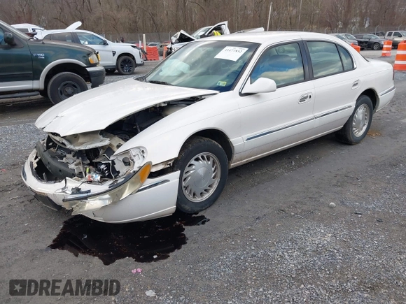 1998 Lincoln Continental with VIN 1LNFM97VXWY619313, listed as a IAAI auction lot 41477852 with 158,973 mi miles. Bid and sale history available at carsss.com. Image 18.