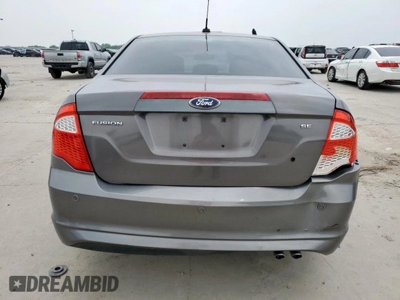 2012 Ford Fusion SE z VIN 3FAHP0HA9CR226737, wystawiony jako Copart lot #57229835 z przebiegiem 204 811 mil mil oraz Szkoda całkowita • Salvage title. Historia ofert i sprzedaży dostępna na DreamBid. Obrazek 6.