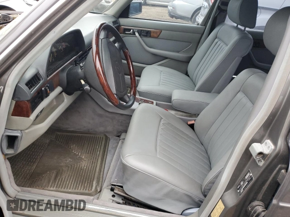 1987 Mercedes-Benz 560 with VIN WDBCA39D7HA322057, listed as a Copart auction lot 83717904 with 246,060 mi miles and Clean Title. Bid and sale history available at DreamBid. Image 7.