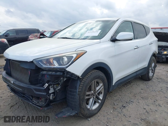 2018 Hyundai Santa Fe 2.4L z VIN 5NMZTDLB9JH060895, wystawiony jako IAAI lot #41939221 z przebiegiem 89 960 mil mil oraz . Historia ofert i sprzedaży dostępna na DreamBid. Obrazek 18.
