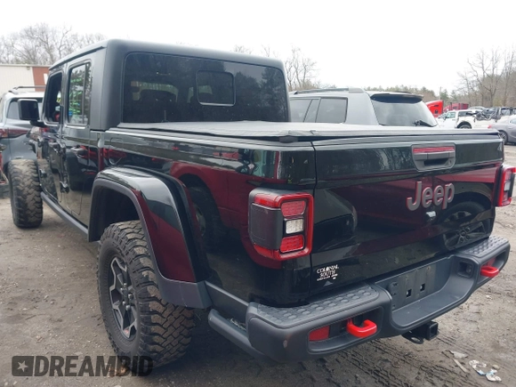 2021 Jeep Gladiator Rubicon z VIN 1C6JJTBG8ML524215, wystawiony jako IAAI lot #41829990 z przebiegiem 62 942 mil mil oraz . Historia ofert i sprzedaży dostępna na DreamBid. Obrazek 3.