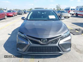 2023 Toyota Camry SE with VIN 4T1G11AK1PU809099, listed as a IAAI auction lot 41450292 with 128,099 mi miles. Bid and sale history available at carsss.com. Image 12.