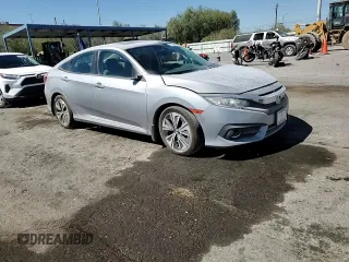 2017 Honda Civic Sedan EX-L with VIN 2HGFC1F7XHH644352, listed as a Copart auction lot 67604814 with 56,972 mi miles and Salvage Title. Bid and sale history available at carsss.com. Image 10.